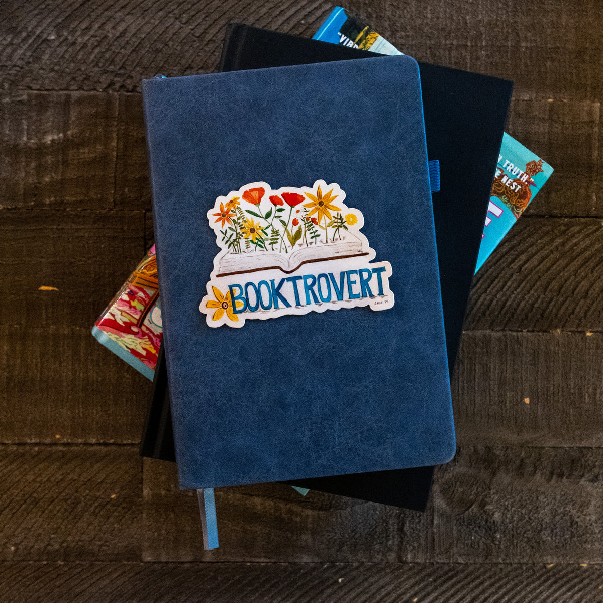 Book Lover Sticker – “Booktrovert” Glossy Waterproof Vinyl Sticker (3x2 Inch)